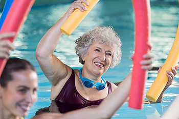 Woman in Water Aerobics class