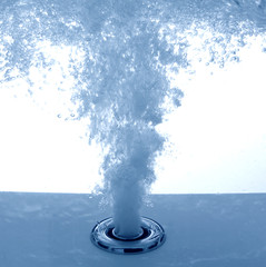 Walk-in tub hydromassage jet